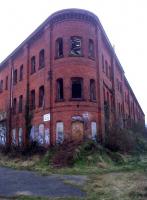 The Bonded Goods Depot at Derby Friargate was virtually derelict on my last visit in 1981; so for a brick building without much roof, and with extensive internal arson damage, it's doing well more than 30 years on. This is the East end of the building, which used to include an apartment for the depot manager. One way and another, you wouldn't want to live there now.<br><br>[Ken Strachan 21/02/2013]