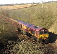 66074 with coal bound for Longannet power station on 26 February 2013. The train is about to pass the bridge carrying the B7036 Mauchline to Ochiltree road.<br><br>[John Steven 26/02/2013]