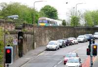 A Glasgow Queen Street - Edinburgh Waverley service approaching its scheduled stop at Linlithgow in May 2005. View is west along the appropriately named Back Station Road.<br><br>[John Furnevel 11/05/2005]