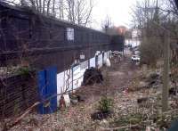 Looking along the south wall of the old station towards the arched bridge over Friargate [see image 42203]. This was a large station, with ample capacity for holiday makers to travel to Skegness. What is not clear from this angle is that behind the white rectangle on the upper wall, four arches' worth of platform collapsed in about 1980. This was well after the station closed; but quite alarming for the lady who had just put some teabags in the bins.<br><br>[Ken Strachan 21/02/2013]