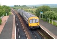 Westbound DMU 101306 enters Fauldhouse station in 1990 with an Edinburgh - Glasgow Central service.<br><br>[Ewan Crawford //1990]