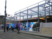Part of the new mural that has begun to appear alongside the work in progress at Haymarket station, seen here on 6 March 2013.<br><br>[John Yellowlees 06/03/2013]