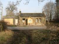 Frontage of the former Rosslynlee station on the Peebles loop on 6 March 2013, half a century after closure. View is north east towards Hawthornden Junction. The level crossing stood to the right of the building. [See image 25306]<br><br>[John Furnevel 06/03/2013]