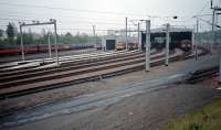 View looking east at Corkerhill Depot in 1987. At this time the limit of electrification was the former westbound platform line, a reversing spur for the depot. The line was to re-open to passengers three years later.<br><br>[Ewan Crawford 26/05/1987]