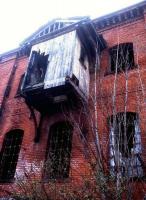 When they say it's a dangerous structure, they're not kidding. This loading alcove attached to the Bonded Goods Depot at Derby Friargate looks distinctly the worse for wear in February 2013.<br><br>[Ken Strachan 21/02/2013]