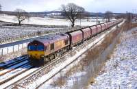 Approaching Alloa from the east on 11 March, DBS 66065 passes Alloa loop with the 4J06 Longannet - Hunterston empties.<br><br>[Bill Roberton 11/03/2013]