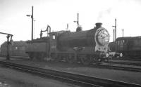 Scene at Thornton Junction in October 1965. J37 0-6-0 no 64569 simmers in the yard, while in the right background is class 08 no D3342.  <br><br>[K A Gray 19/10/1965]