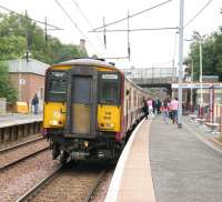 A Larkhall - Dalmuir train boarding at Hamilton West in August 2006.<br><br>[John Furnevel 01/08/2006]