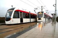 Trams to and from Edinburgh Airport passing at Ingliston on 8 March 2013 during demo operations.<br><br>[John Furnevel 08/03/2013]