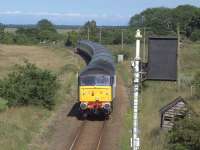 47810 about to pass a signal sighting board on the approach to Reedham in 2011. <br><br>[Ian Dinmore //2011]
