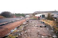 Railway remains at Kelso in 1998 looking west along the up platform. The station site was undergoing conversion to a new road at the time and the old road bridge would not last much longer. [See image 44208]<br><br>[Ewan Crawford //1998]