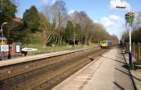 The station at Hindley is extremely well looked after. 142052 heads east towards Crow Nest Junction on a service to Manchester Victoria on 11 March 2013.<br><br>[John McIntyre 11/03/2013]