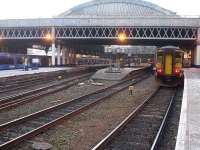 156493 has arrived at Glasgow Queen Street on 19 February at the rear of a 6 car class 156 commuter service. The unit stands ready to work back out as the Oban portion of the 08.21 West Highland line service to Oban and Mallaig. <br><br>[David Pesterfield 19/02/2013]