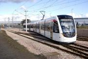 Edinburgh car 271 enters the Airport terminus with a training run on 21 March.<br><br>[Bill Roberton 21/03/2013]