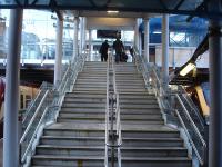 Looking up to the new glazed walkway by Market Street entrance with a Scotrail 334 EMU in Platform 8 ready to leave with the 12.07 to Milngavie via Bathgate and a CrossCountry Voyager at Platform 9 just arrived on the 07.06 from Birmingham New Street, via York. <br><br>[David Pesterfield 04/02/2013]