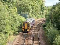 158712 accelerates east after leaving Maryhill station with an Anniesland - Queen Street service on an August afternoon in 2006. The train has just passed below Maryhill Road. [See image 10851]<br><br>[John Furnevel 14/08/2006]