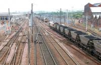 Hunterston - Longannet supply line. Full and empty coal trains passing at Polmadie depot in August 2006. View is east towards Rutherglen. <br><br>[John Furnevel 15/08/2006]