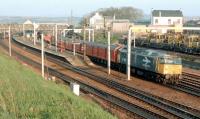 47653 reverses the Edinburgh portion of the 'postal' back into Carstairs and onto the rear of the Glasgow portion in 1988. The combined train will shortly head south behind 86239 [see image 42533].<br><br>[Ewan Crawford //1988]