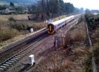 <h4><a href='/locations/B/Bathampton'>Bathampton</a></h4><p><small><a href='/companies/G/Great_Western_Railway'>Great Western Railway</a></small></p><p>A 158 heading for Weymouth approaches the former station and Bathampton Junction past a rather decrepit looking hut on 30 March 2013. The A4 dual carriageway provides competition to the right; but due to the angle of the sun, I had to cut out the hot air balloons taking off from the city of Bath. View looks South-West. 15/122</p><p>30/03/2013<br><small><a href='/contributors/Ken_Strachan'>Ken Strachan</a></small></p>