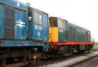 Class 20s in the sidings at Leeming on the Wensleydale Railway in July 2012. Nearest the camera is 20121 looking a little the worse for wear, with 20166 beyond.<br><br>[John Furnevel 09/07/2012]