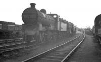 J6 0-6-0 64191 stabled for the weekend in the shed yard at Colwick on Sunday 28 August 1960. The locomotive was eventually withdrawn from Boston in February 1962.<br><br>[K A Gray 28/08/1960]
