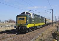Deltic D9009 <I>Alycidon</I> charges past St Germains level crossing with a Pathfinder Tours excursion from Crewe to Edinburgh on 6 April.<br><br>[Bill Roberton 06/04/2013]