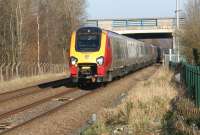 On the afternoon of 6 April 2013, a pair of Voyagers westbound under the M6 motorway at Bamber Bridge with the 1M57 Glasgow Central - Birmingham New Street. The train had been diverted via the Settle and Carlisle route due to engineering work on the WCML north of Preston.<br><br>[John McIntyre 06/04/2013]