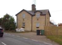 The station master's house at Rockingham, North-West of Corby, on 5th April. Notice the fence across the former crossing, above the car on the left. The platforms and a waiting shelter are still present, but in view of the tall fences, I respected the owners' privacy.<br><br>[Ken Strachan 05/04/2013]