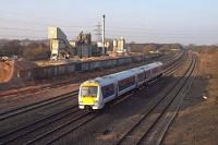 A southbound Class 172 two coach Turbostar approaches Banbury on 2nd March 2013 with a Chiltern Railways service. On the left is the Lafarge Aggregates coating plant.<br><br>[Mark Dufton 02/03/2013]