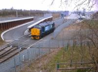 At last! Ever since they extended DIRFT across the A5, I've been trying to photograph a main line engine in daylight [see image 36944]. This is 37194, apparently on the naughty step on 9th April. The sting in the tail is that it is currently not a main line engine, as it is employed as the North terminal shunter.<br><br>[Ken Strachan 09/04/2013]