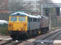 WCRC 47245 leaves Preston on 11 April 2013 hauling 87002, the last mainline registered Class 87, on its way south from Carlisle to Willesden [see image 42691].<br><br>[John McIntyre 11/04/2013]