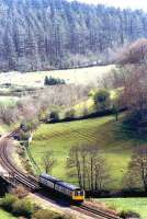 A DMU for Barnstaple nearing Eggesford in 1990.<br><br>[Ian Dinmore //1990]