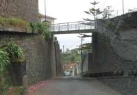 After a locomotive boiler exploded in 1939 killing four people confidence in the Madeira rack railway ebbed away and it closed in 1943. The upper section was only open for 30 years and after closure part of it was converted into the road seen here looking down towards Monte station.<br><br>[Mark Bartlett 23/03/2013]