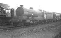 Guests at Bidston shed, Birkenhead, on 15 April 1962 include class 04 2-8-0s 63848 (nearest) and 63767 from Gorton, with Saltley 9F no 92129 on the adjacent road.<br><br>[K A Gray 15/04/1962]