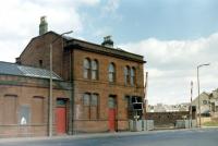 The frontage of Ardrossan Town station looking across Princes Street in 1985. The level crossing is on the right. [See image 7530].<br><br>[Colin Miller //1985]