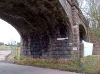 How many uses can one old viaduct have? We've already seen the car port [see image 42567], here the other end of the viaduct forms part of a farmer's livestock pen and supports a street name plaque. Hmm - should be strong enough for the latter purpose!<br><br>[Ken Strachan 31/03/2013]