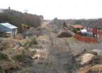 Site of the planned Newtongrange station looking south on 12 April 2013. For the view north on the same day from the bridge in the distance [see image 42753].<br><br>[John Furnevel 12/04/2013]