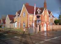 The former station building at Lidlington has been extended substantially in the Bedford direction (left). Notice the two heights of platform - both now replaced by a new platform on the Bletchley (right) side of the crossing.<br><br>[Ken Strachan 18/04/2013]