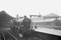 Stanier 8F no 48476 at Blackburn Station on 4 August 1968 after arriving on the RCTS <I>End of Steam Commemorative Rail Tour</I> piloting 73069 from Manchester Victoria. [See image 39440]<br><br>[K A Gray 04/08/1968]