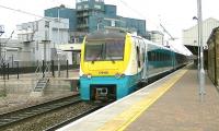 Arriva Trains Wales 175106 leaves Warrington Bank Quay with the 1D37 Manchester Piccadilly - Llandudno service on 18 April 2013.<br><br>[Ken Browne 18/04/2013]