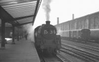 BR Standard Class 5 4-6-0 no 73103 stands at Carlisle platform 1 with the 1S36 8.15am Newcastle Central - Stranraer / Heads of Ayr train on a summer Saturday morning in 1965.<br><br>[K A Gray 24/07/1965]