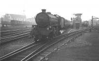 Copley Hill B1 4-6-0 no 61129 brings an unidentified northbound working into Doncaster on a misty morning in July 1962, passing a DMU in the sidings alongside the south box.<br><br>[K A Gray 28/07/1962]