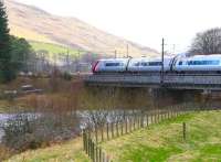 The 14.40 Glasgow Central - London Euston <I>Pendolino</I> crosses the River Clyde at Lamington on 23 April 2013.<br><br>[John Furnevel 23/04/2013]