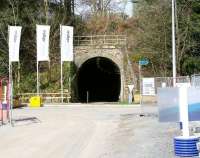 Looking west towards  Auchendinny Tunnel on 20 April, with the remains of the former station located just beyond the far end. Taken from the site of Dalmore Mill, the last of the Midlothian paper mills on the North Esk, closed in 2004. The old mill has since been demolished and a new housing development is currently underway here.<br><br>[John Furnevel 20/04/2013]