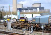 The end. 66093 stands in the shadow of Didcot A on 26 April 2013. The coal-fired power station had been disconnected from the national grid 5 weeks earlier after 43 years of service. The six iconic cooling towers will eventually be pulled down removing the notable landmark from the Oxfordshire skyline. [See image 39406]<br>
 <br><br>[Peter Todd 26/04/2013]