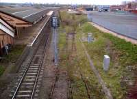 Looking North West towards Birmingham city centre on 28 April 2013. I suspect that this former goods yard would have handled a fair amount of automotive traffic in days gone by. The red brick building on the right was a Lucas plant, while one of the earliest Rover factories was sited nearby. This being a Sunday afternoon, lots of DMUs are stabled in the depot off to the left.<br><br>[Ken Strachan 28/04/2013]