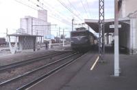 SNCF electric BB 9223 hurries an express south through Port-de-Piles station on the main line from Le Mans in 1979. The class was built from 1958 to 1964 and some remain in front line service on SNCF in 2013. This particular locomotive was the prototype for a HO gauge Marklin model. <br><br>[Mark Bartlett //1979]