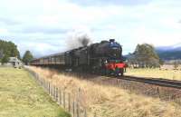 Black 5's 44871+45407 double head the northern portion of the <I>Great Britain VI</I> south to Edinburgh on 27 April 2013. Pictured north of Kingussie with the snow-capped Cairngorms in the background <br><br>[John Gray 27/04/2013]