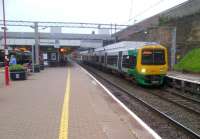 323211 forms the 7.07 to Wolverhampton at Coventry on 20th August 2012. It looks considerably more bright and alert than the photographer! <br><br>[Ken Strachan 20/08/2012]