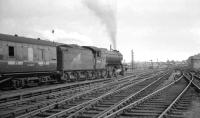 Gateshead V2 2-6-2 no 60964 leaves Carlisle for Newcastle on 27 July 1963 with the 1.40pm ex-Stranraer Harbour.<br><br>[K A Gray 27/07/1963]